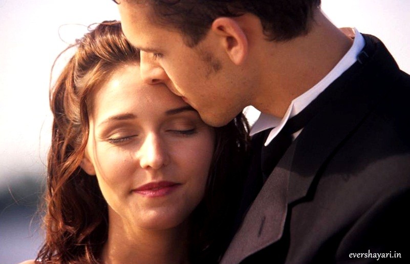 Romantic couple love kiss on forehead