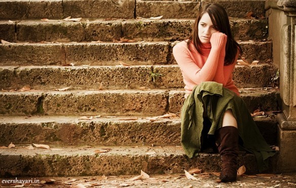 Sad girl sitting alone in love