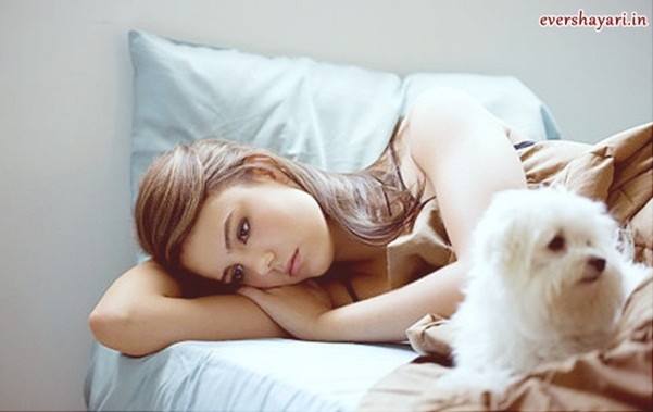 Young Sad Girl Lying on bed