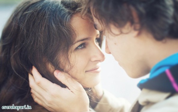 Romantic couple in love look at each other's eyes