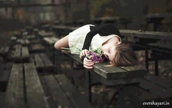 Sad girl with flowers